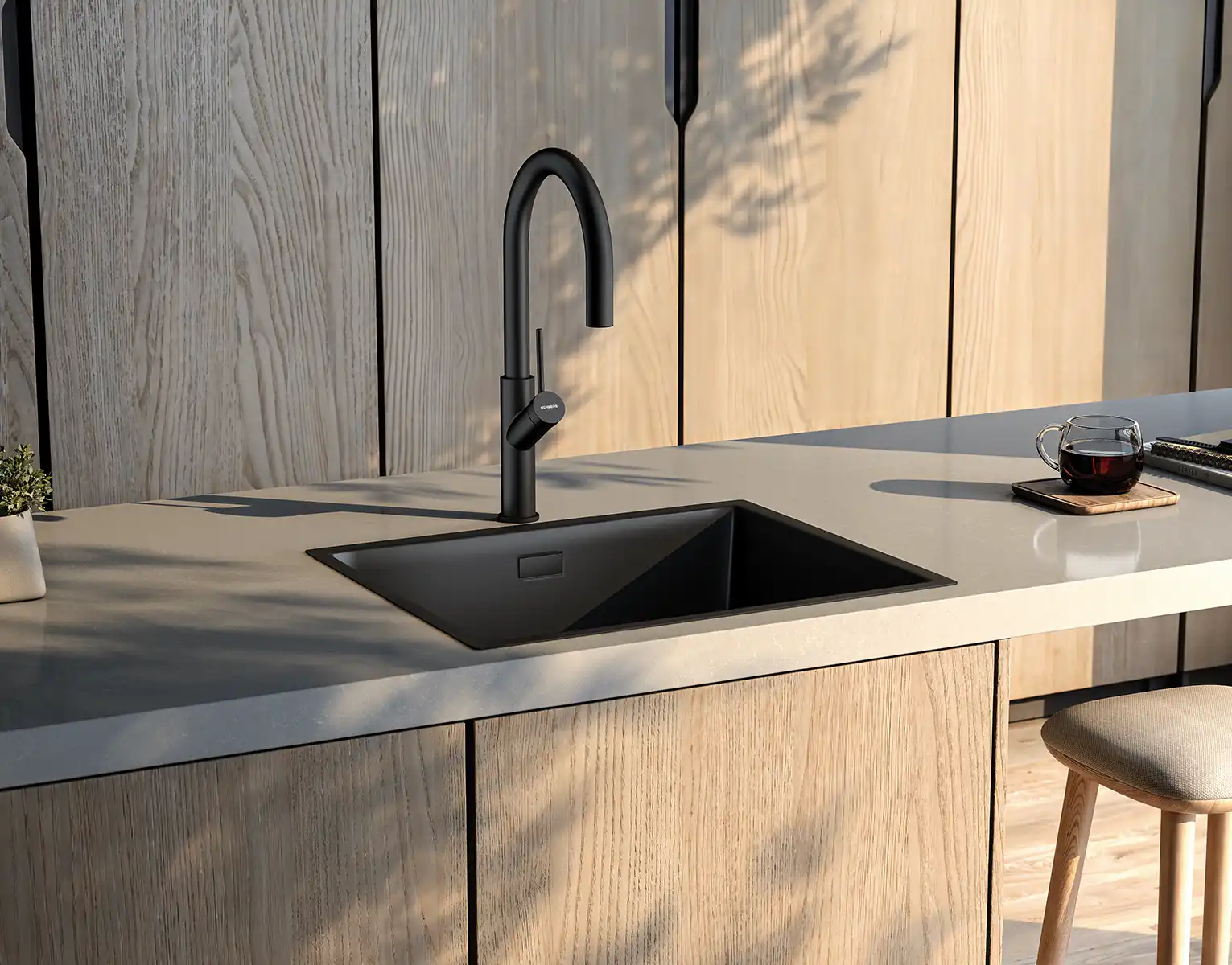 Monomando extraíble caño cisne acabado negro mate.